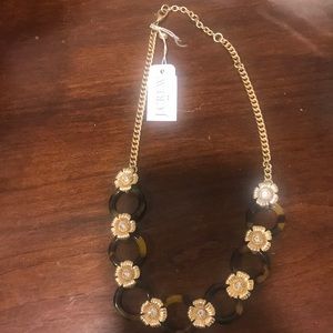 J crew brown and gold necklace . Flowers
